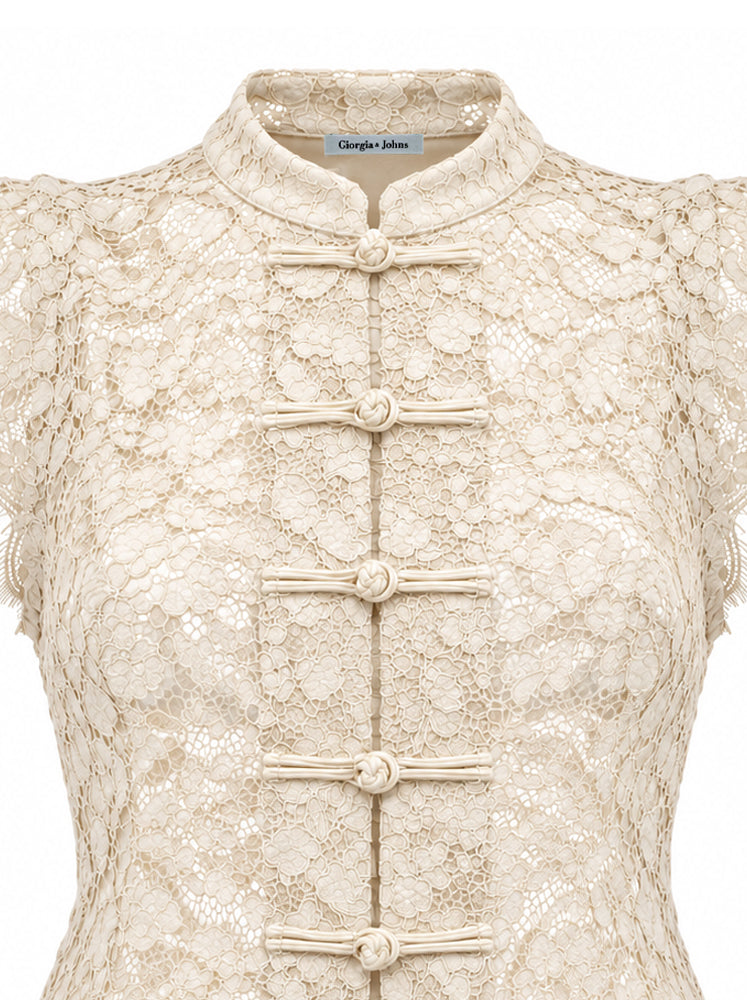 Blusa pizzo con alamari