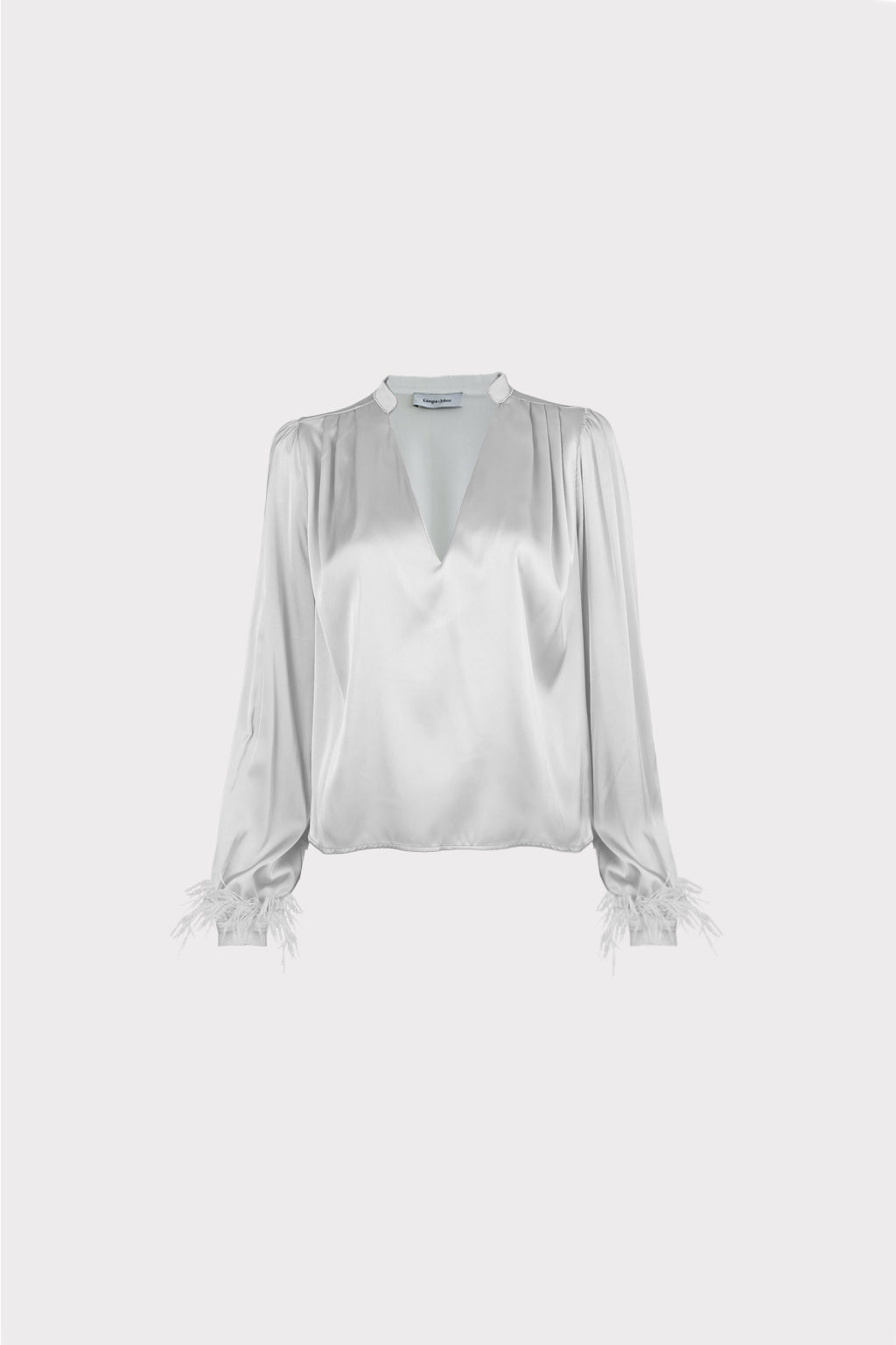 Blusa con piume