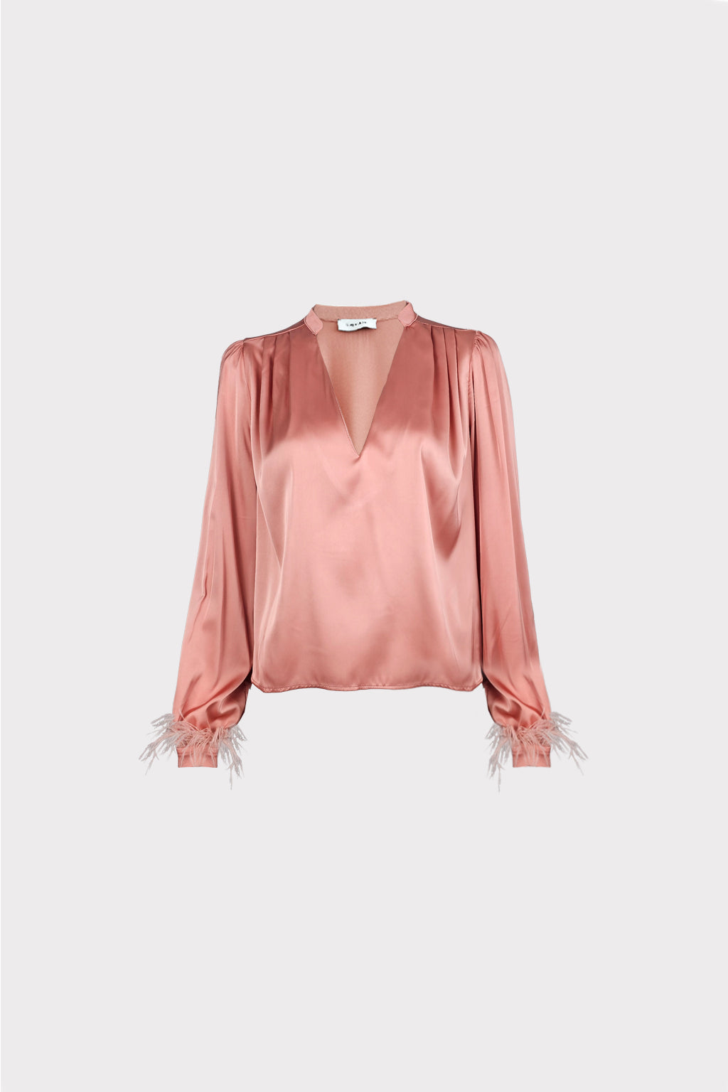 Blusa con piume