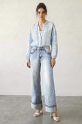 Jeans wide leg con risvolto