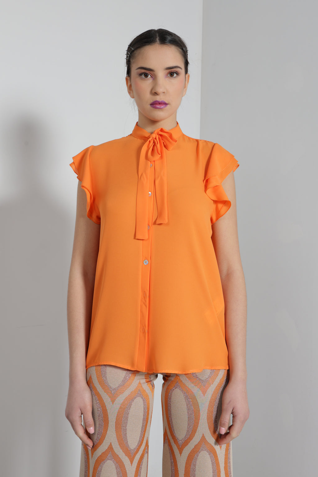 Blusa manica volant