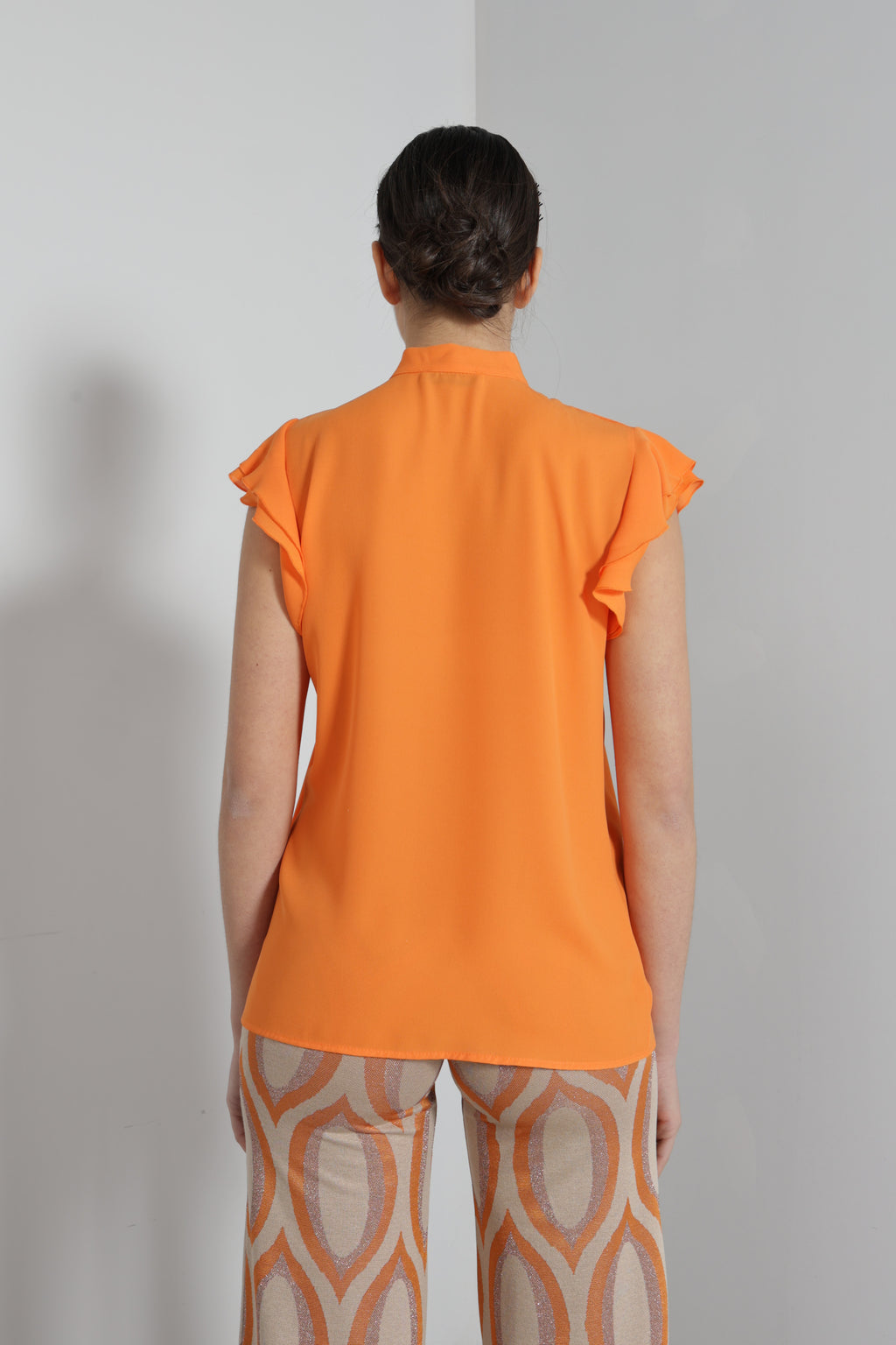 Blusa manica volant