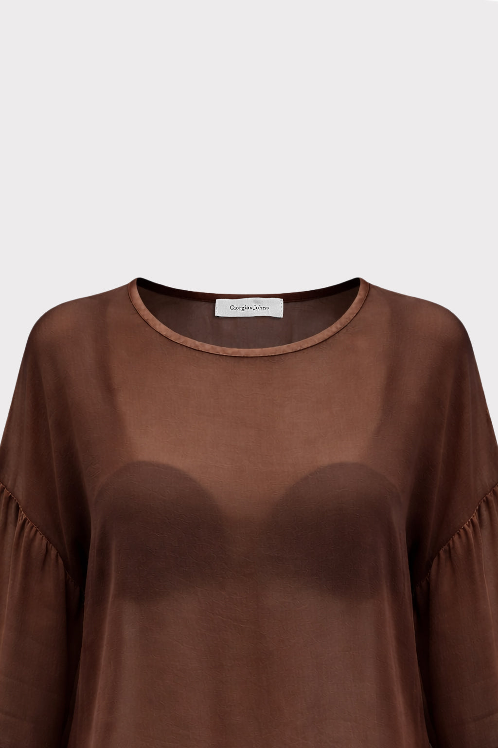 Blusa over semitrasparente