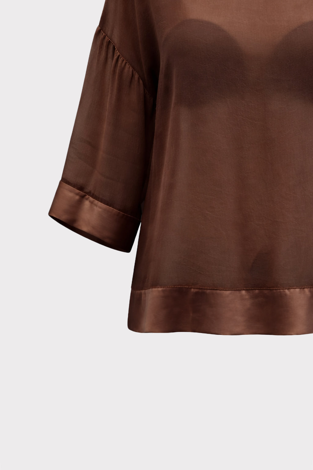 Blusa over semitrasparente