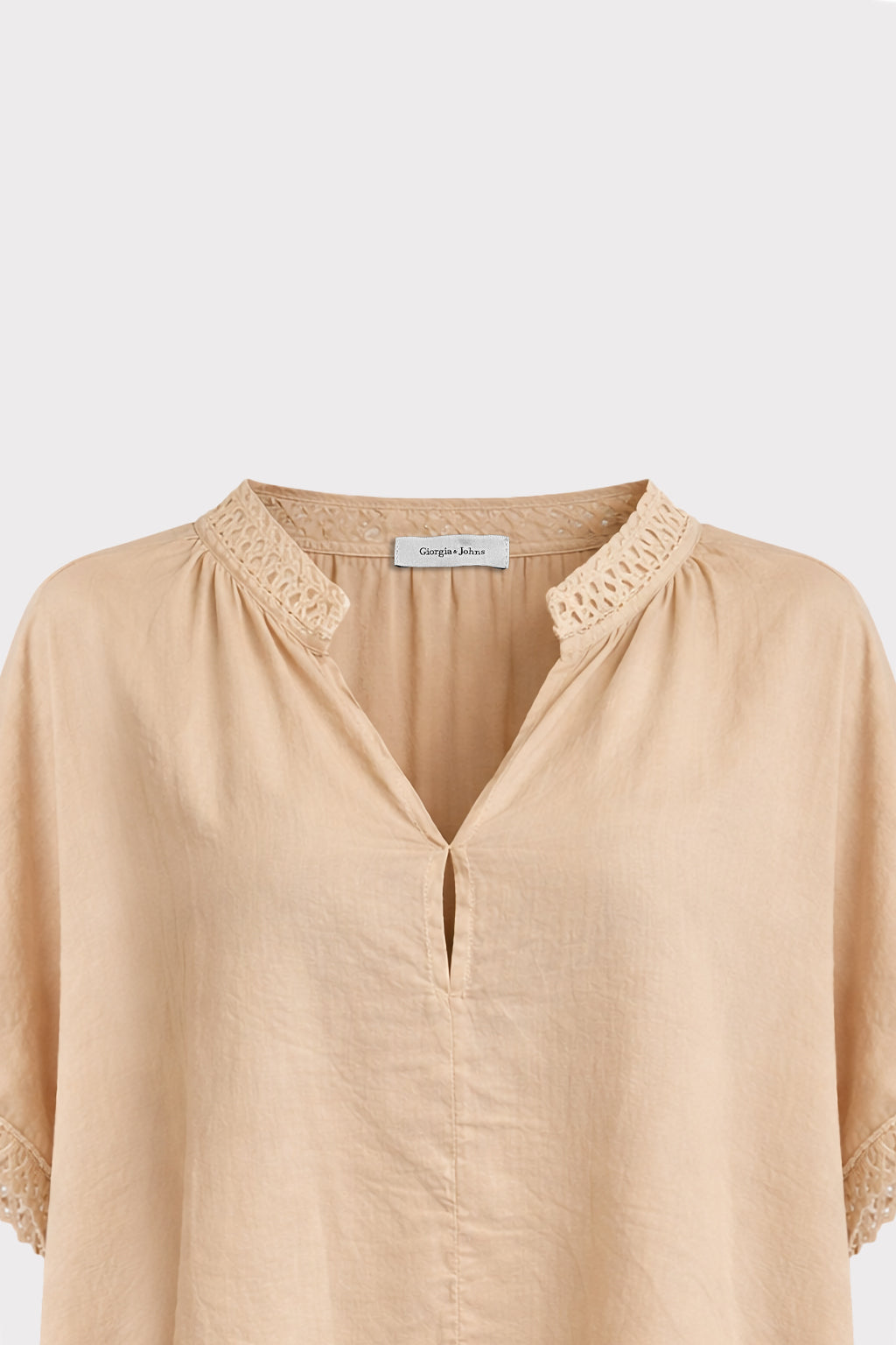Blusa con passamaneria