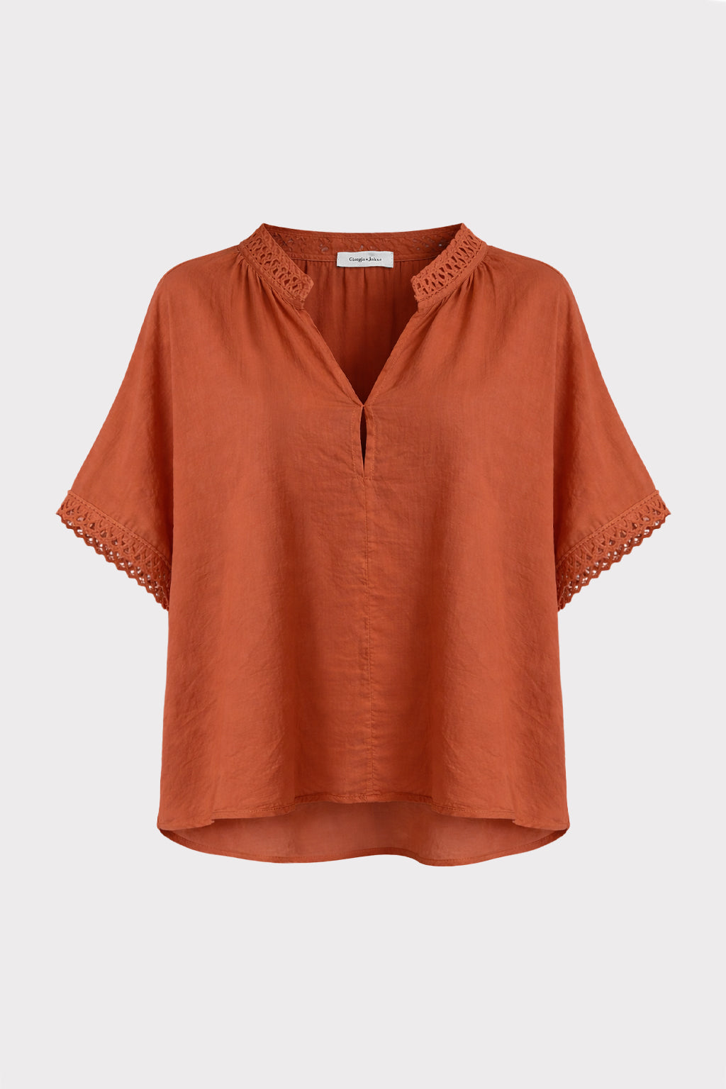 Blusa con passamaneria
