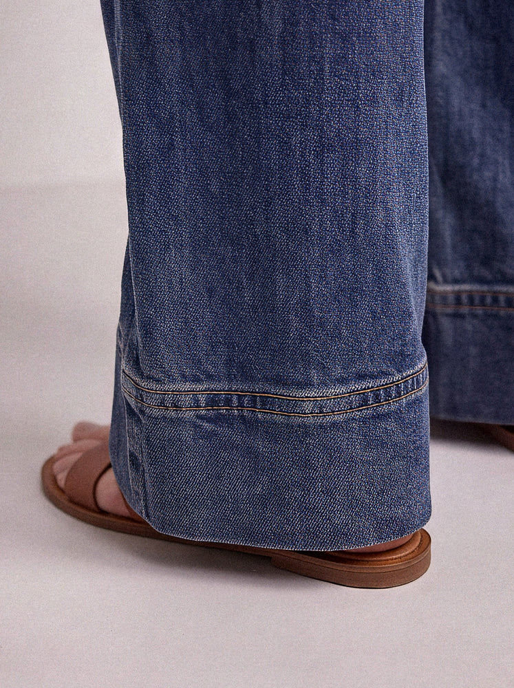 Jeans wide leg con risvolto al fondo