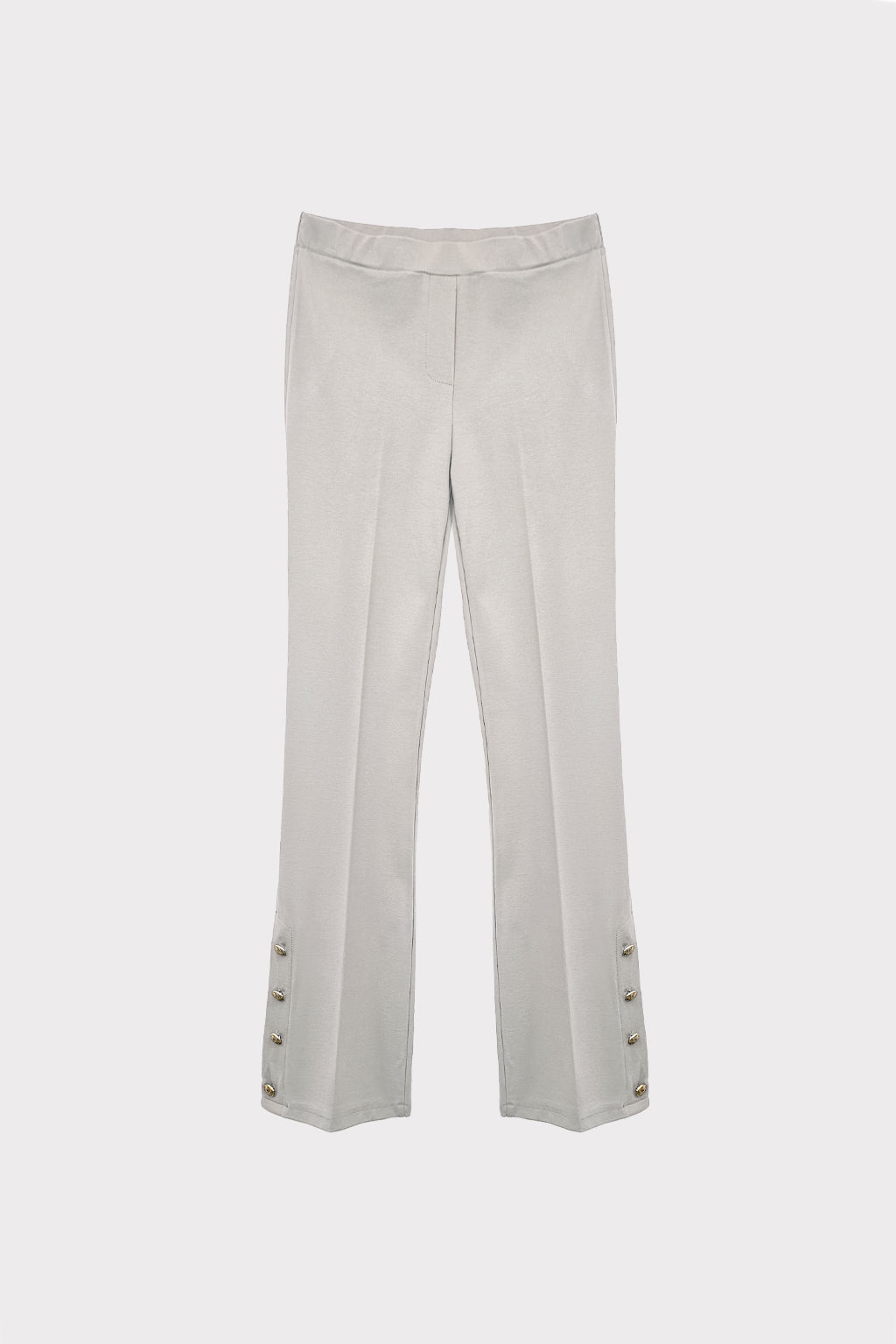 Pantalone zampa bottoni al fondo