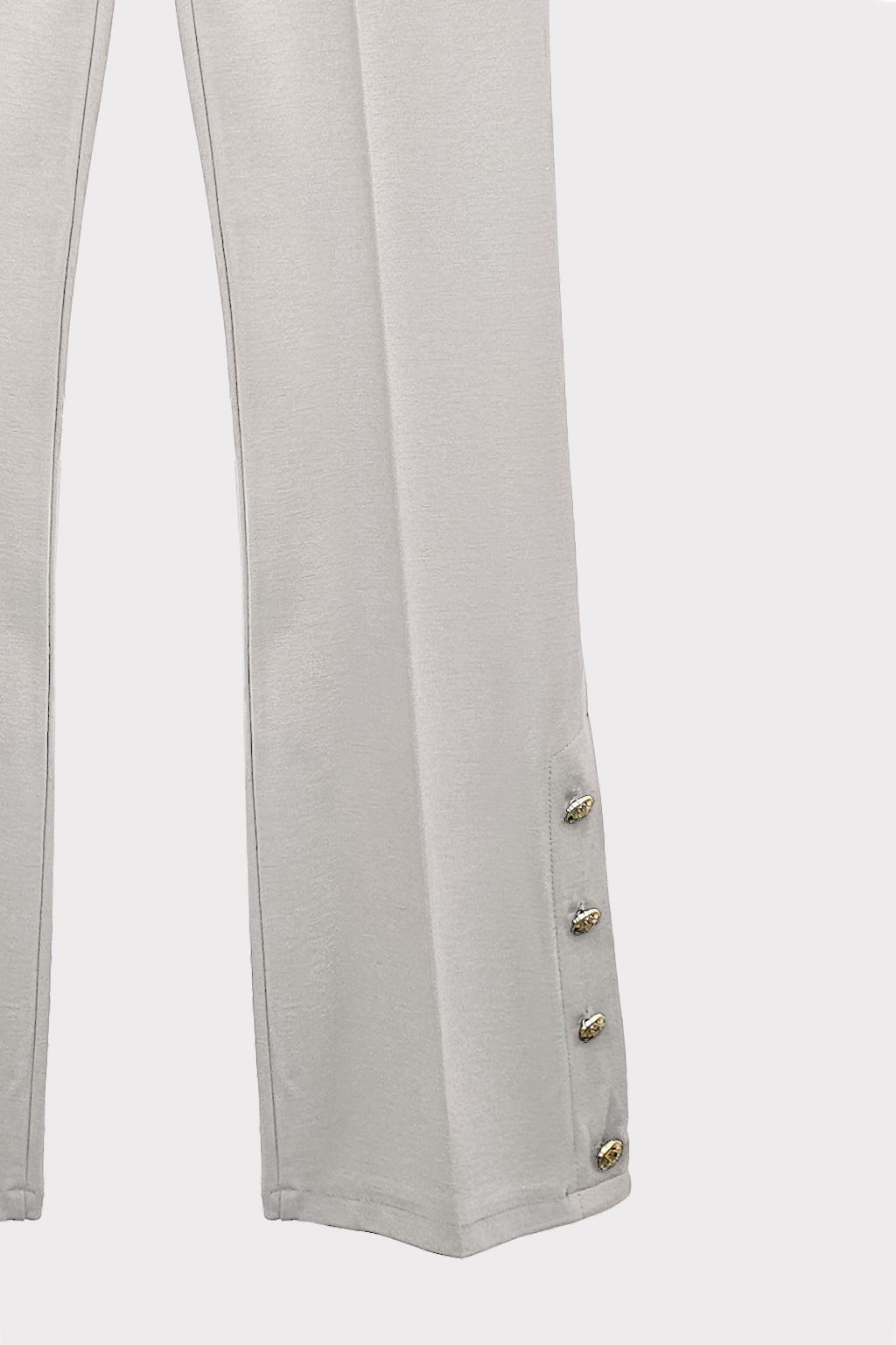 Pantalone zampa bottoni al fondo