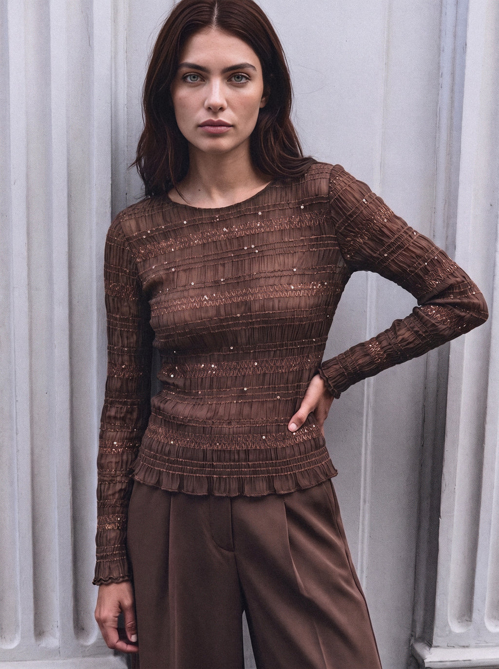 Top in rete plisse' con micropaillettes