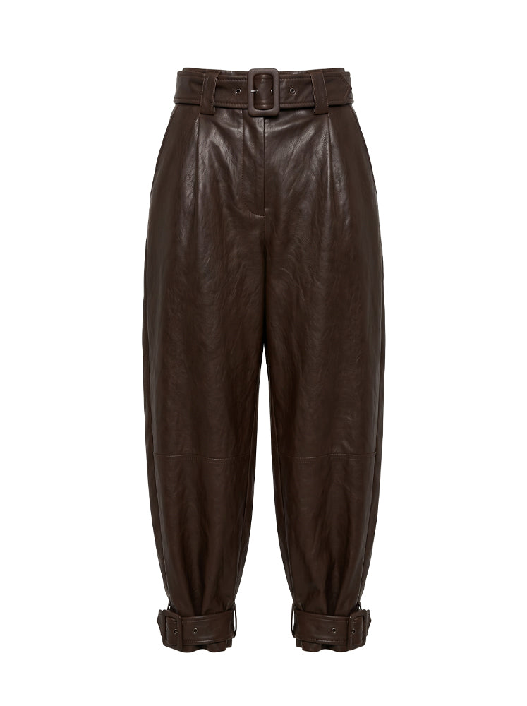 Pantaloni ecopelle con fibbie alla caviglia