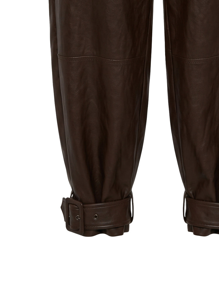 Pantaloni ecopelle con fibbie alla caviglia