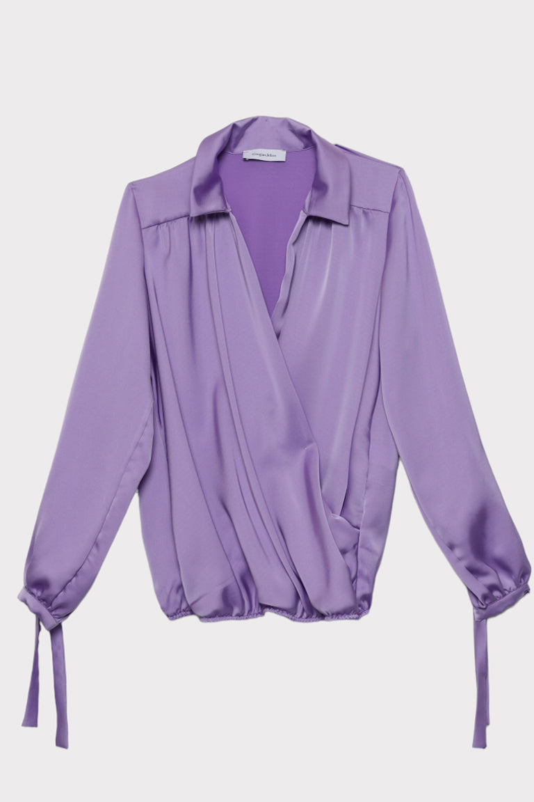 Blusa con polsi fiocco