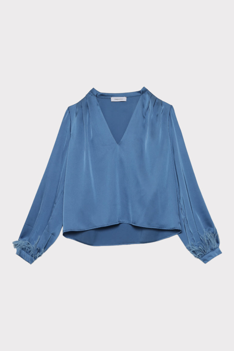 Blusa piume
