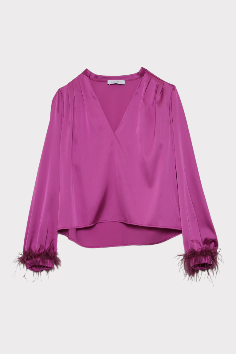 Blusa piume