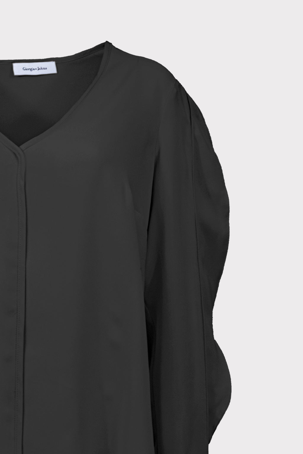 Blusa scollo V con rouches
