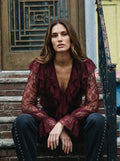 Blusa in pizzo con volants
