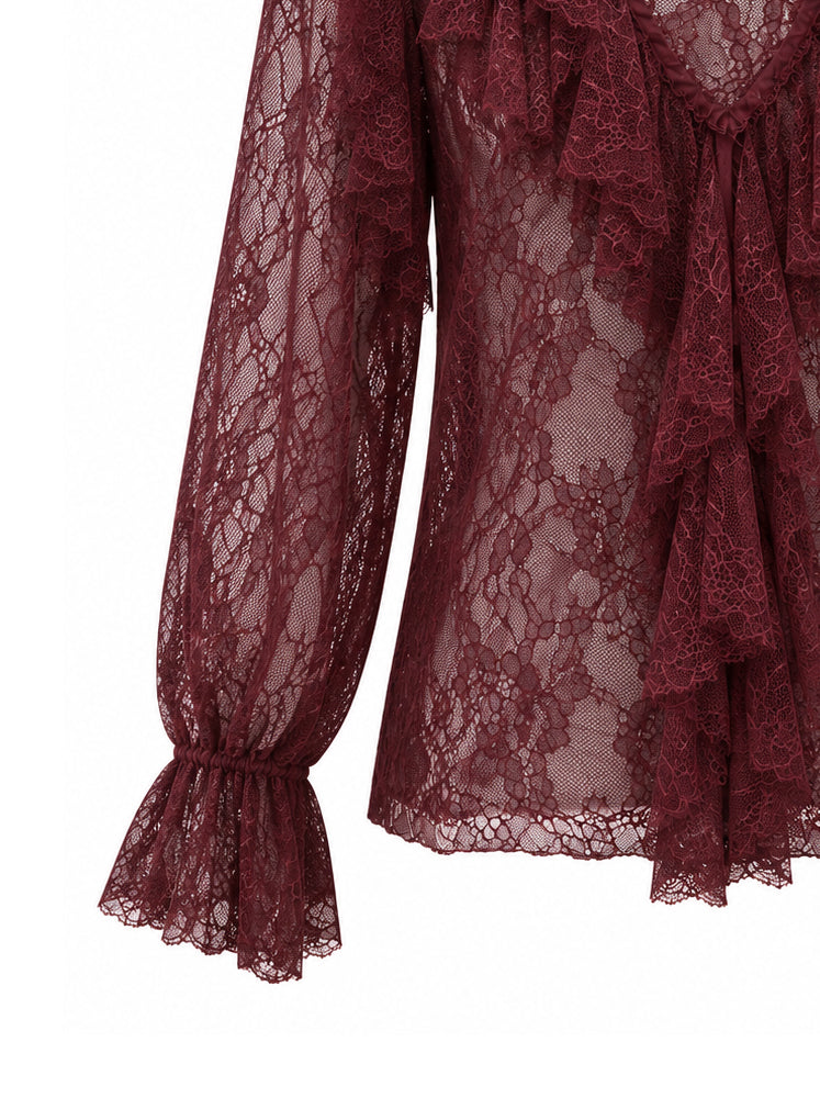 Blusa in pizzo con volants