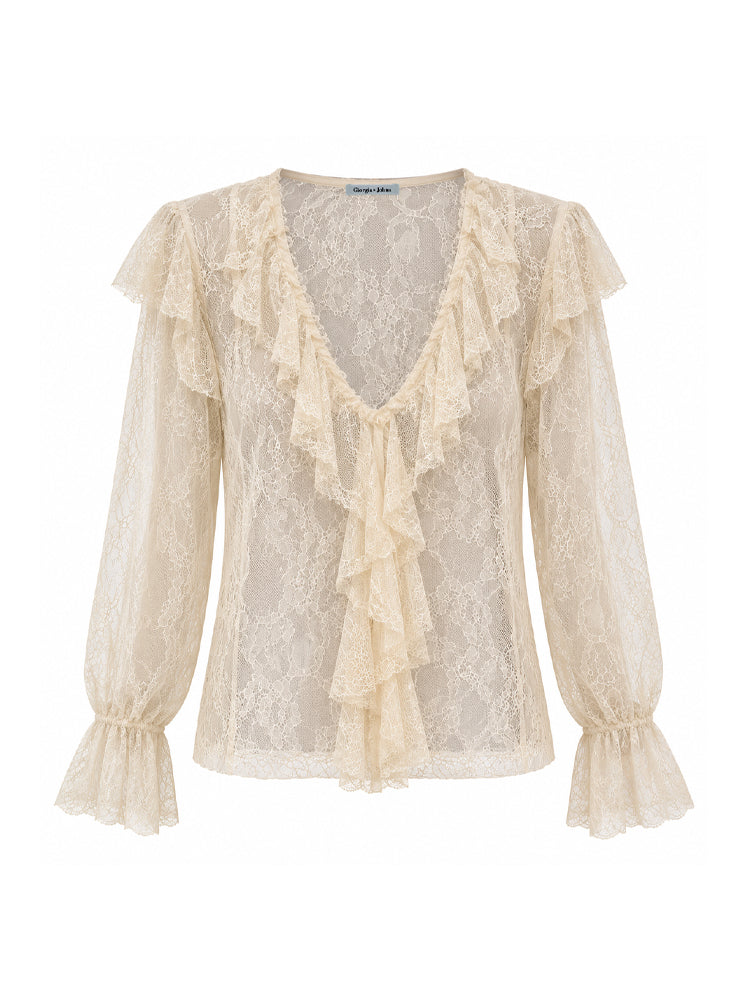 Blusa in pizzo con volants