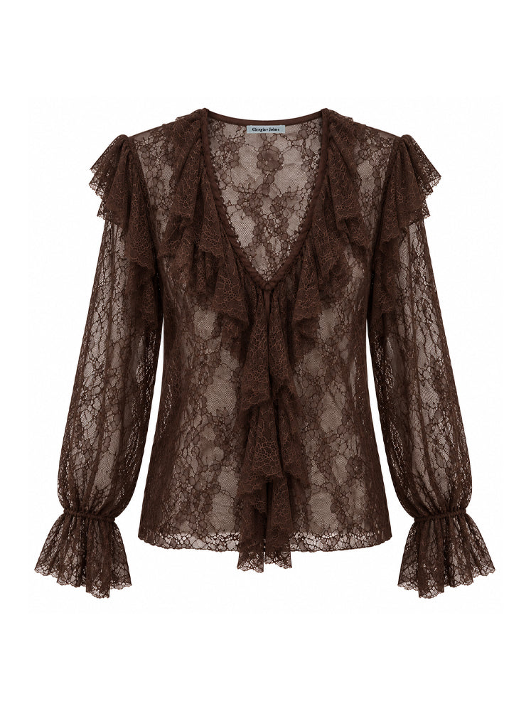 Blusa in pizzo con volants