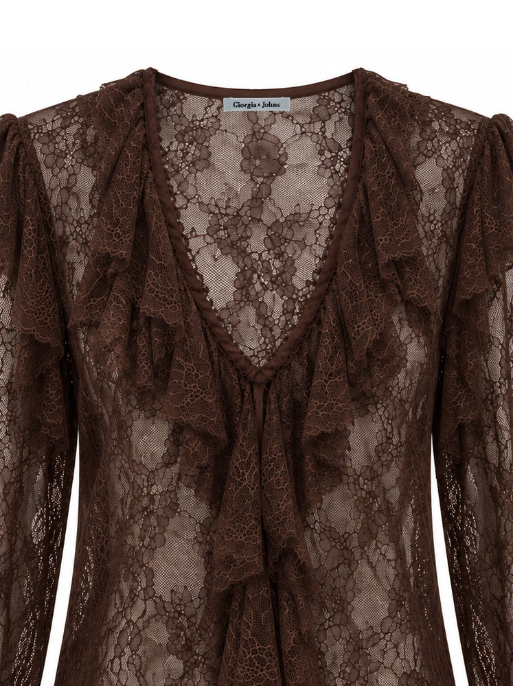 Blusa in pizzo con volants
