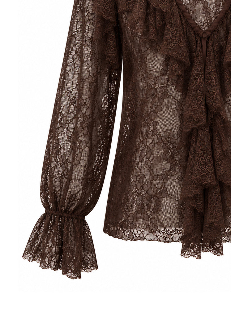 Blusa in pizzo con volants