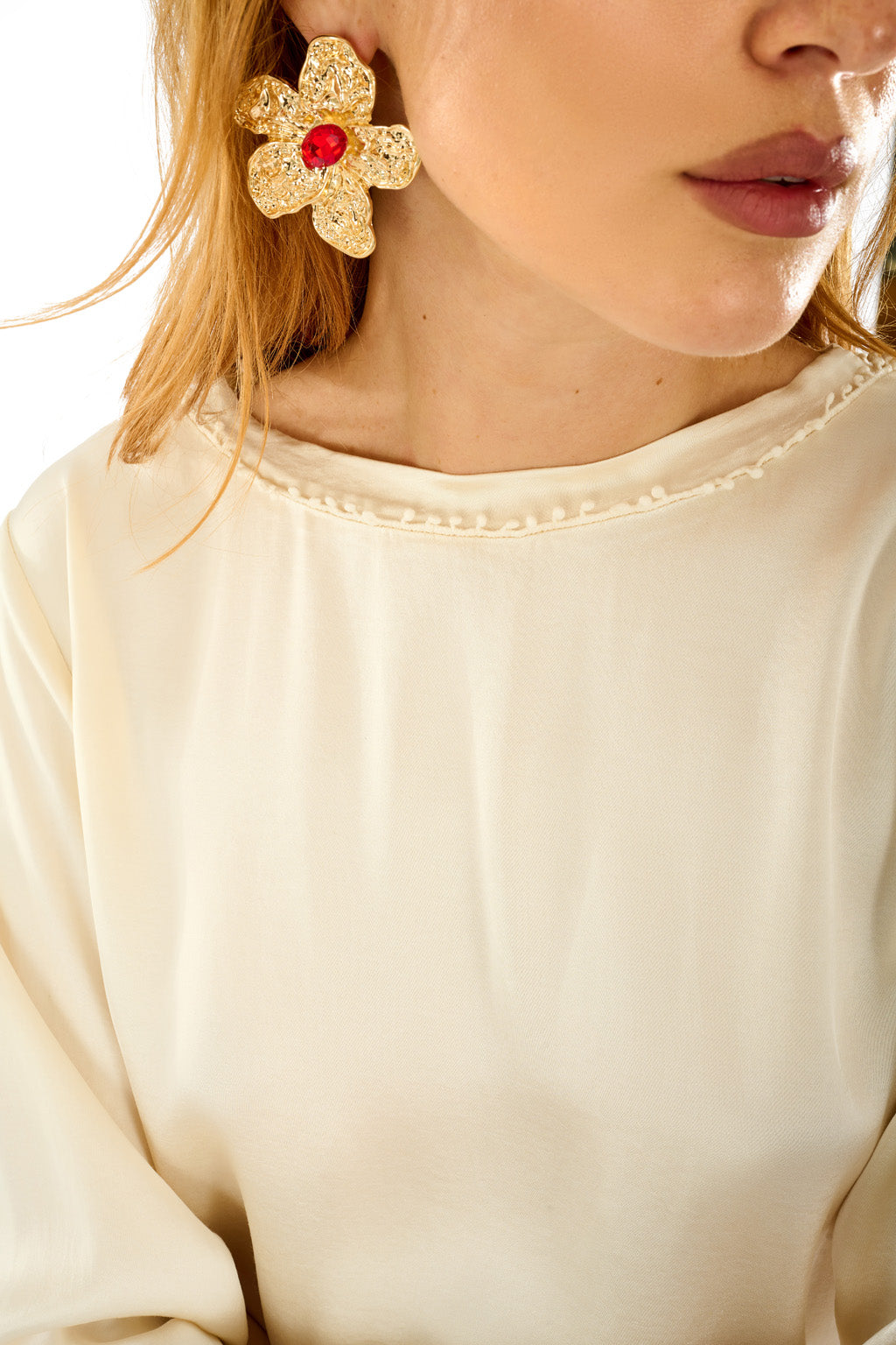 Blusa con passamaneria
