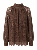Blusa in pizzo collo alto