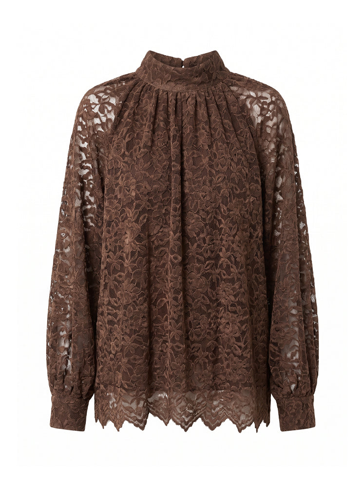 Blusa in pizzo collo alto