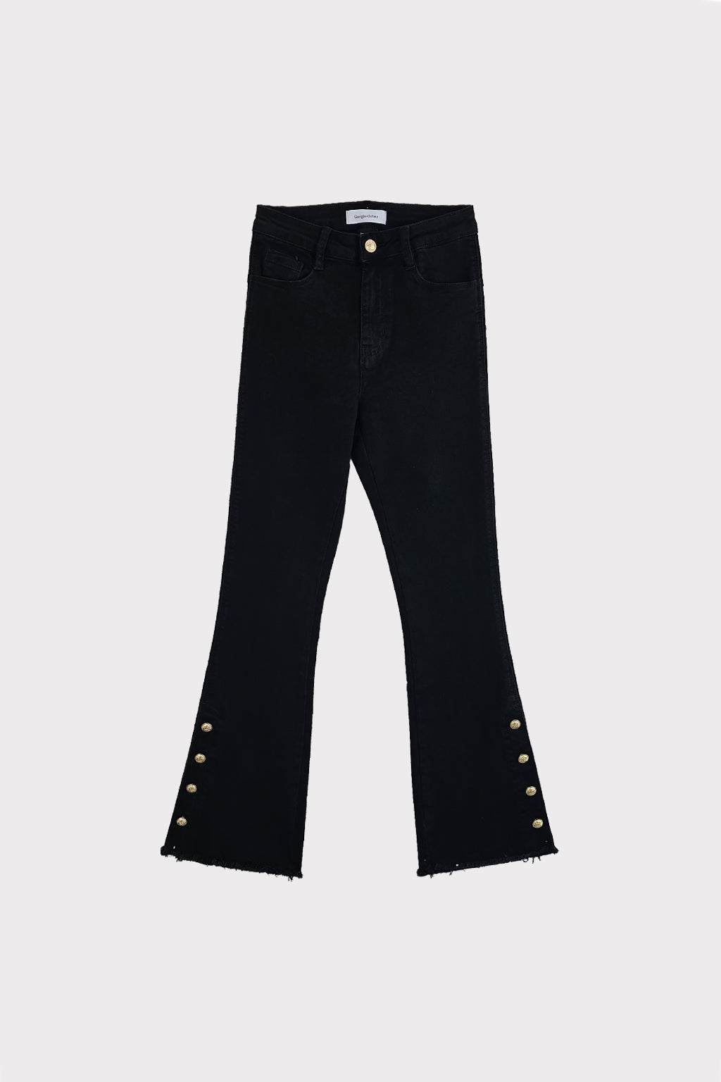 Pantalone con bottoni al fondo