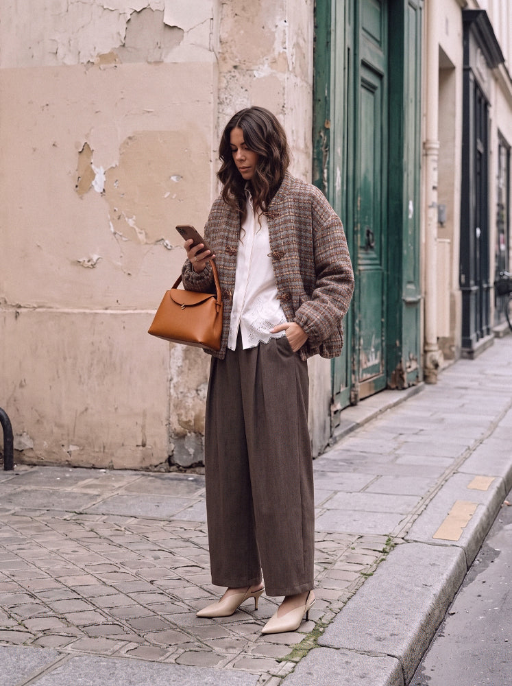 Bomber in tweed con alamari
