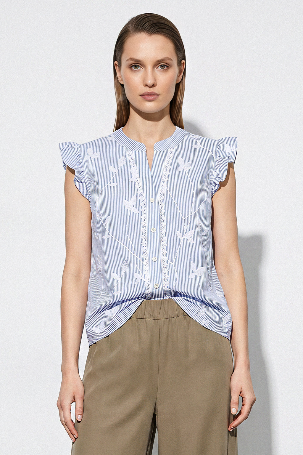Blusa smanicata righe con rouches