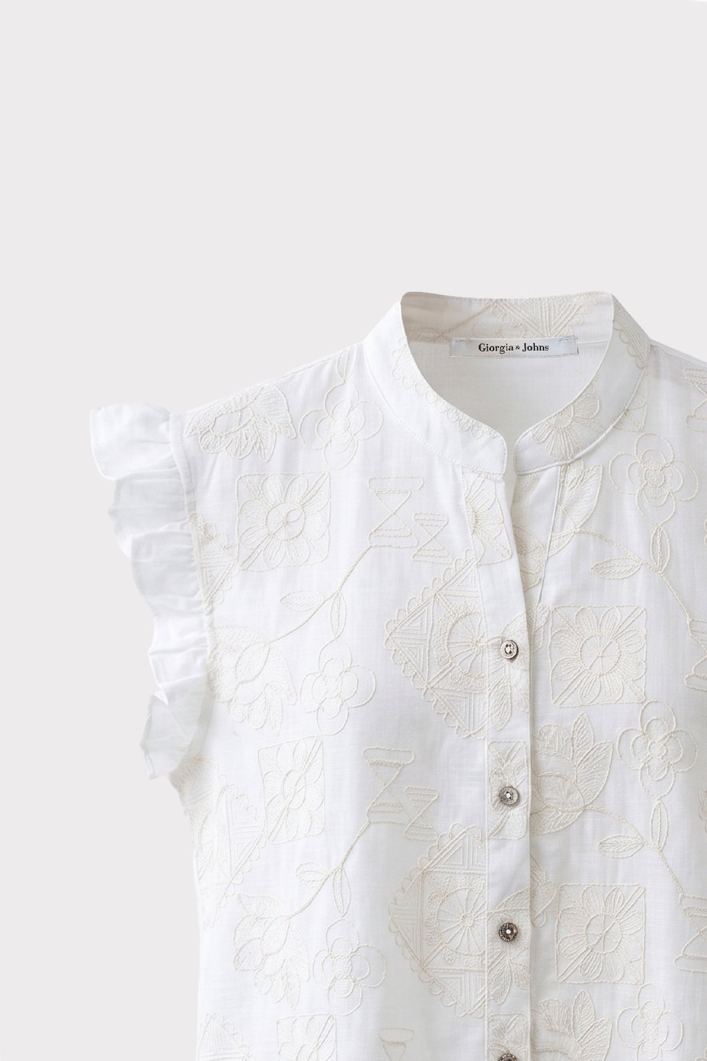 Blusa smanicata ricamo all over