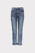 Jeans mom fit con rotture