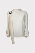 Blusa con fibbia decorativa