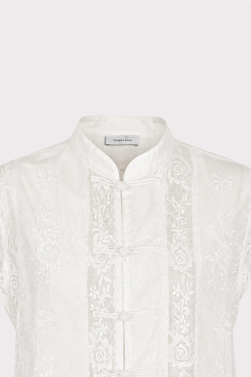 Camicia in pizzo con alamari
