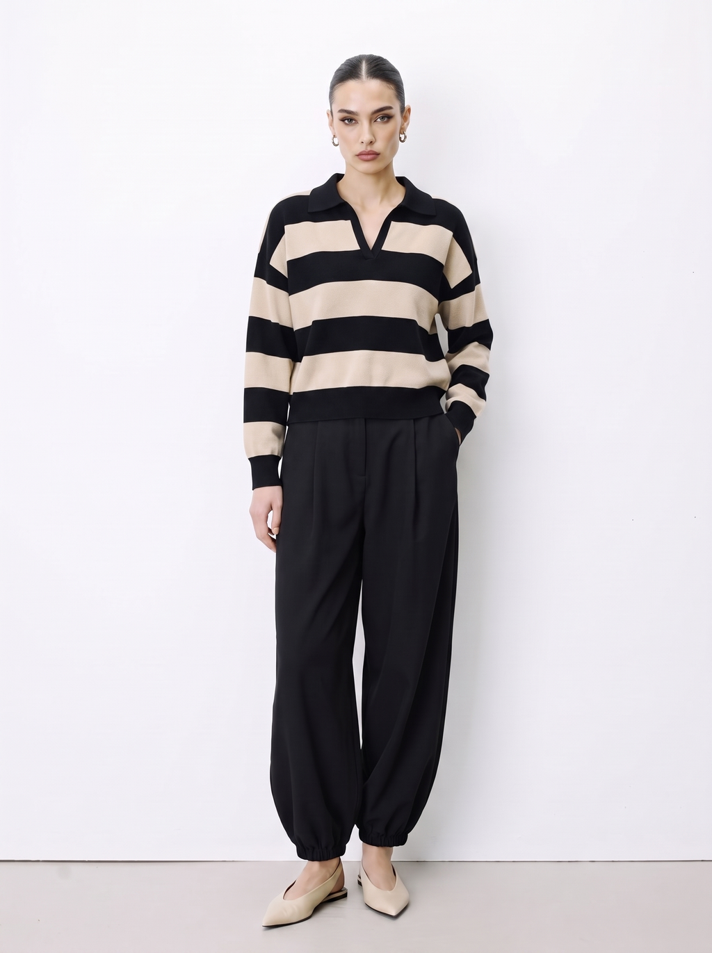 Maglia polo a righe scollo a V