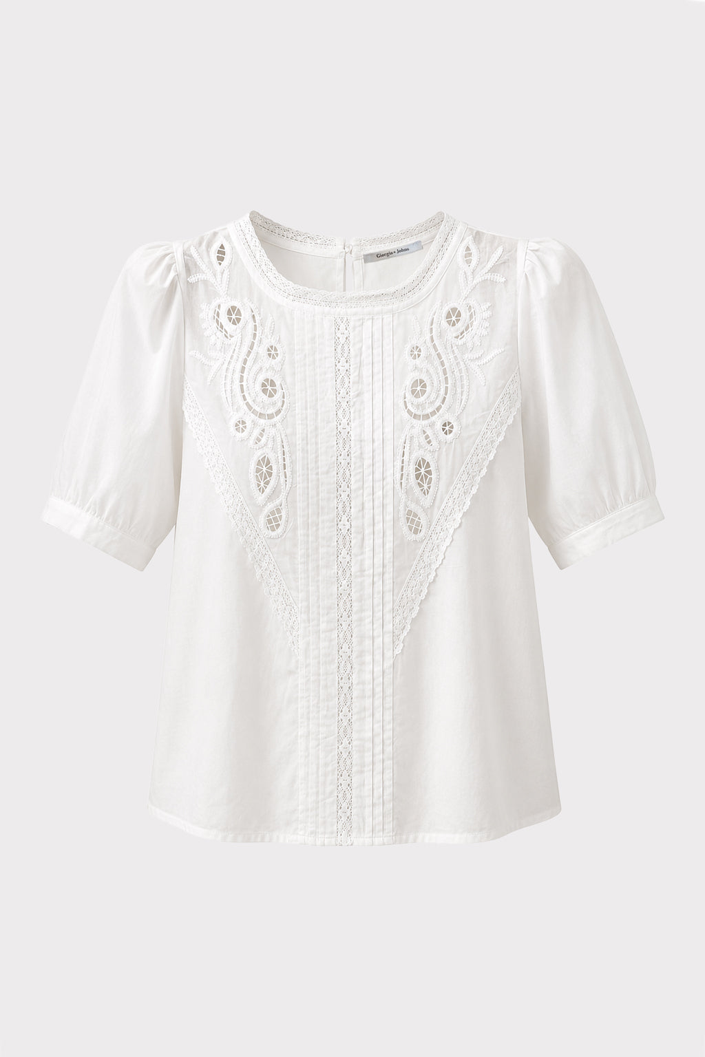 Blusa con ricami sangallo