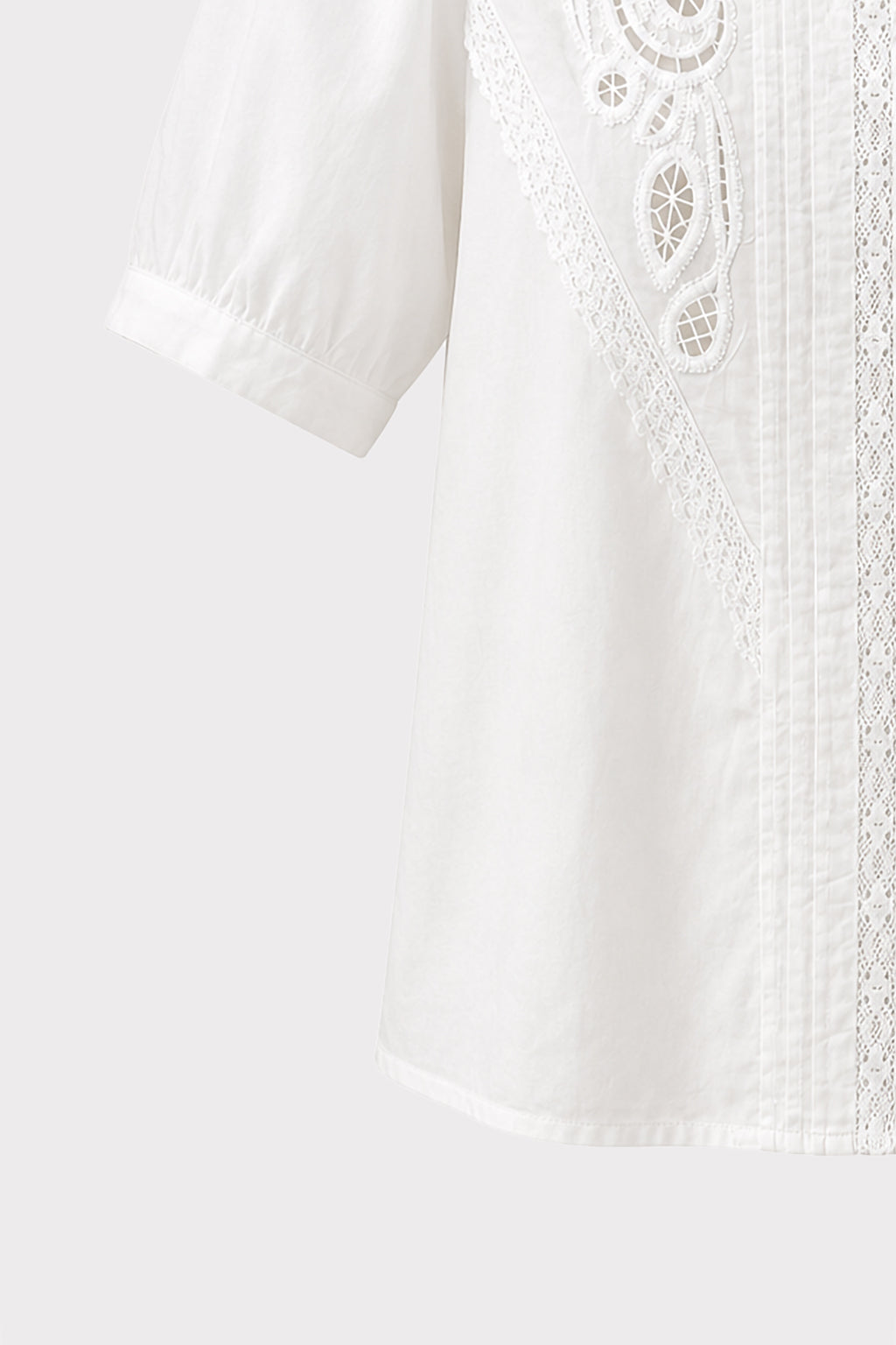 Blusa con ricami sangallo
