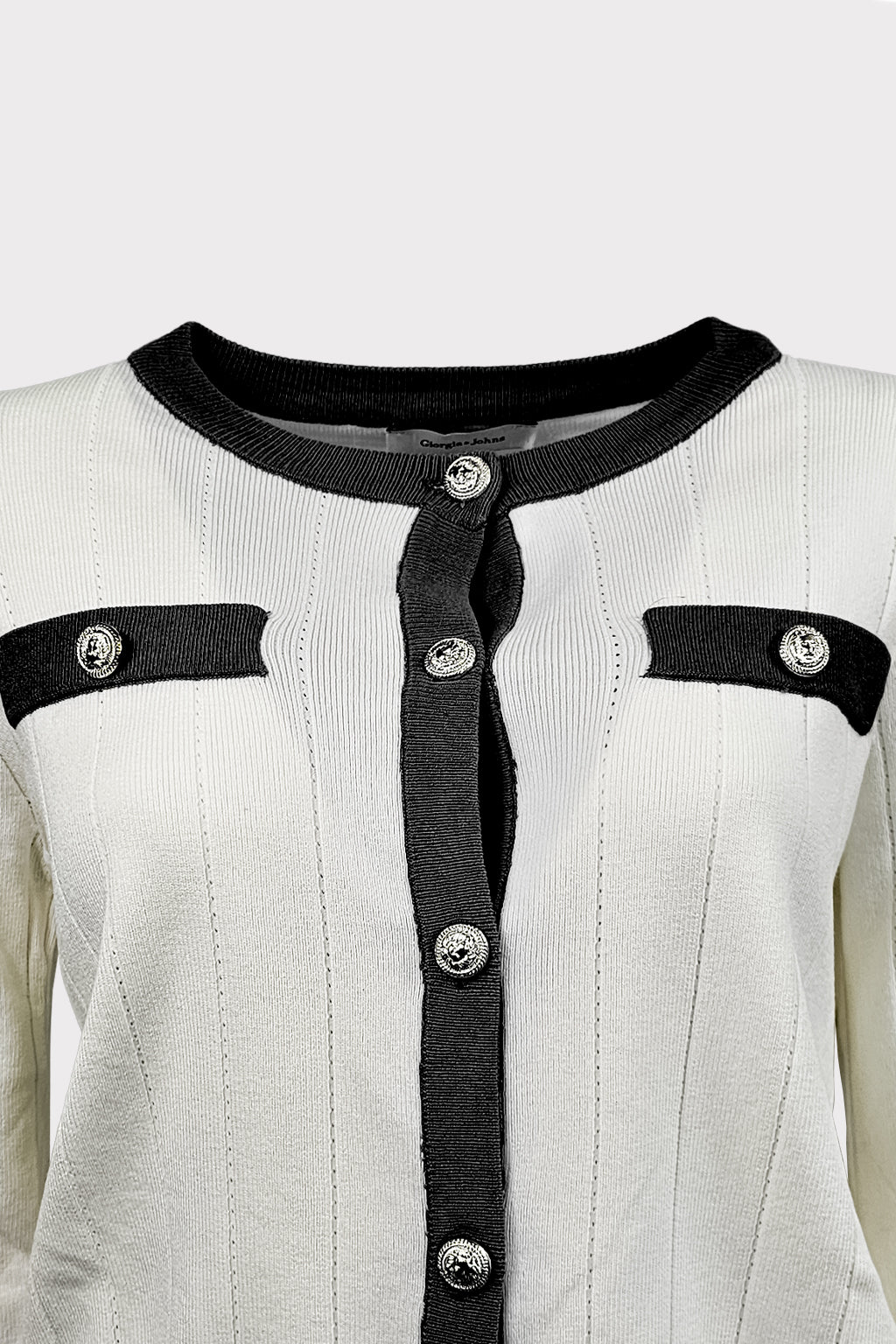 Cardigan bicolor con bottoni gioiello