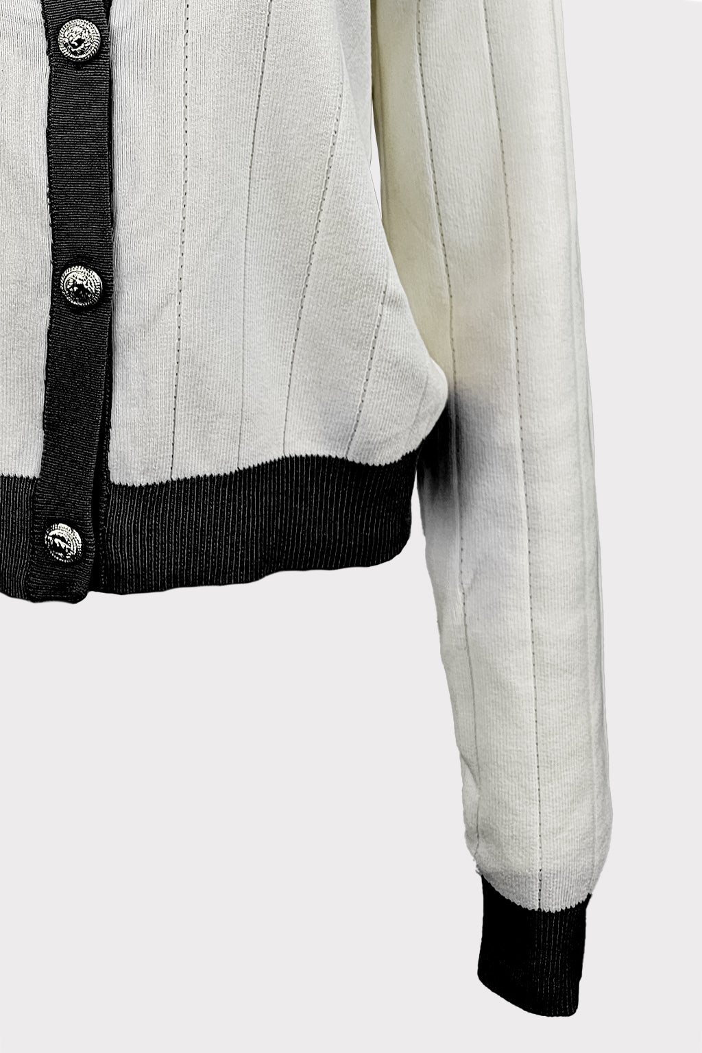 Cardigan bicolor con bottoni gioiello