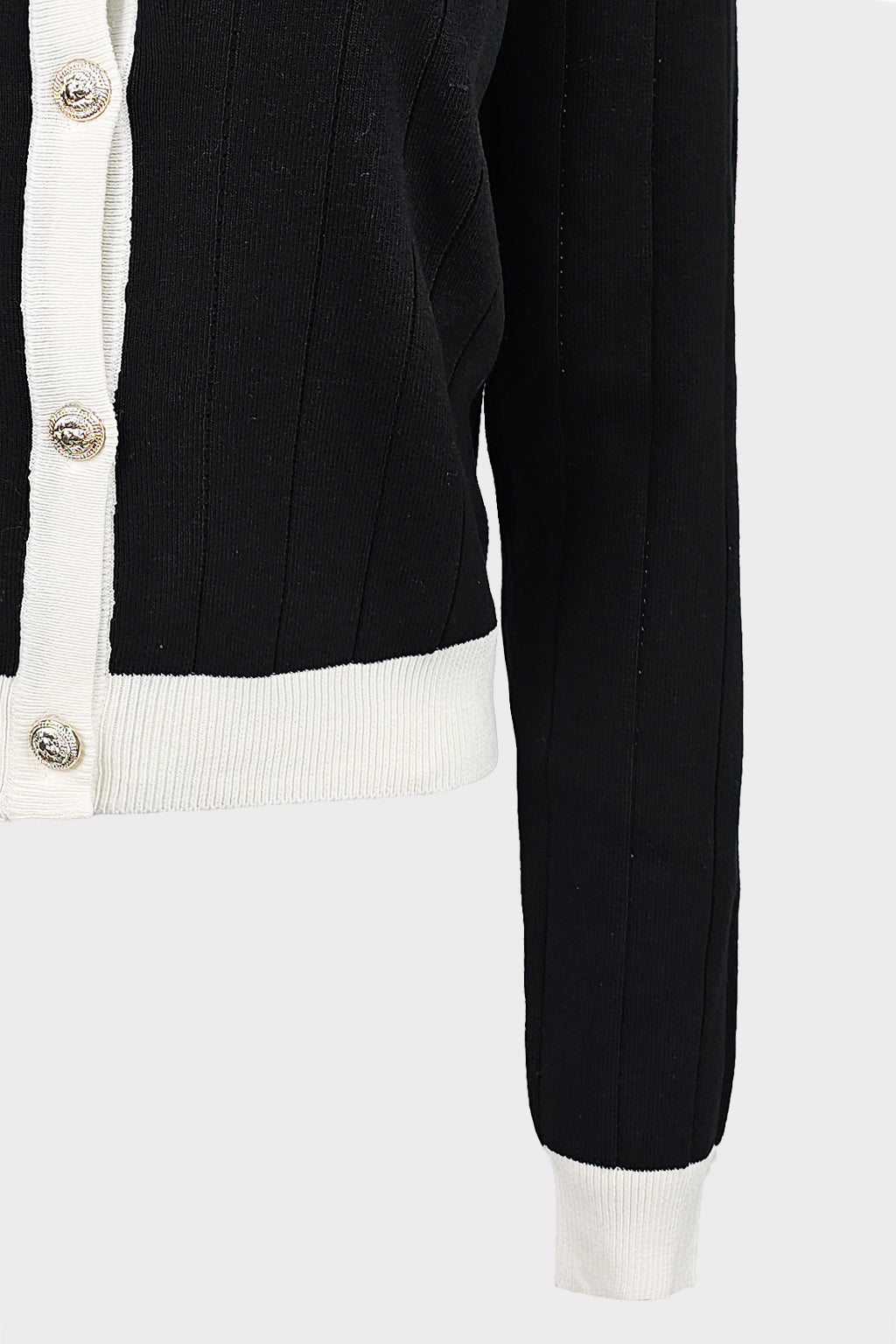 Cardigan bicolor con bottoni gioiello