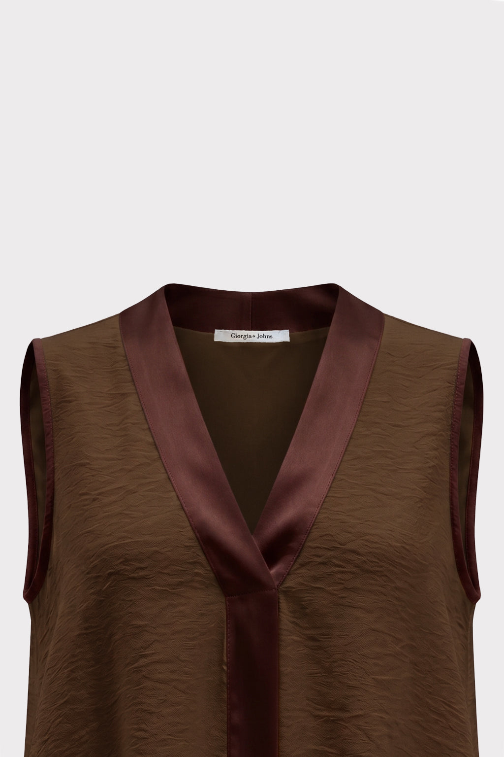 Top smanicato dettagli raso