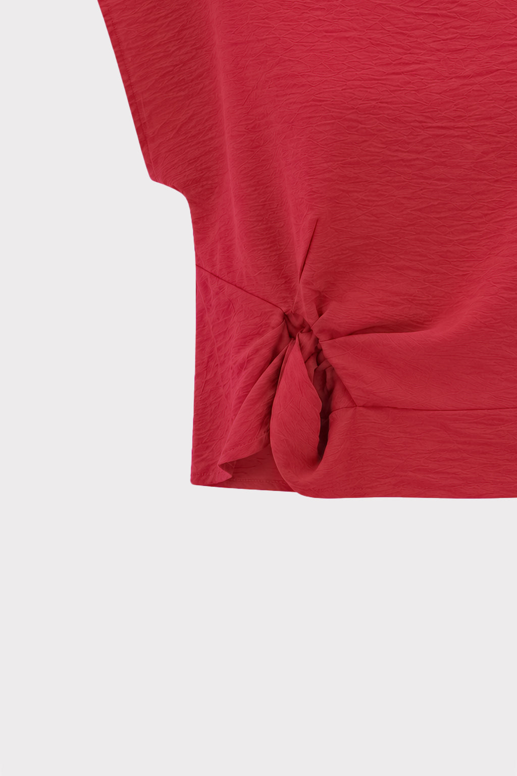 Blusa smanicata con nodo