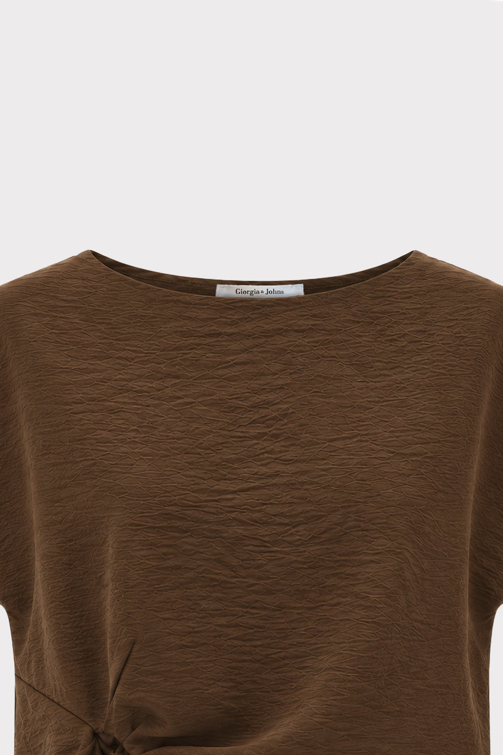 Blusa smanicata con nodo