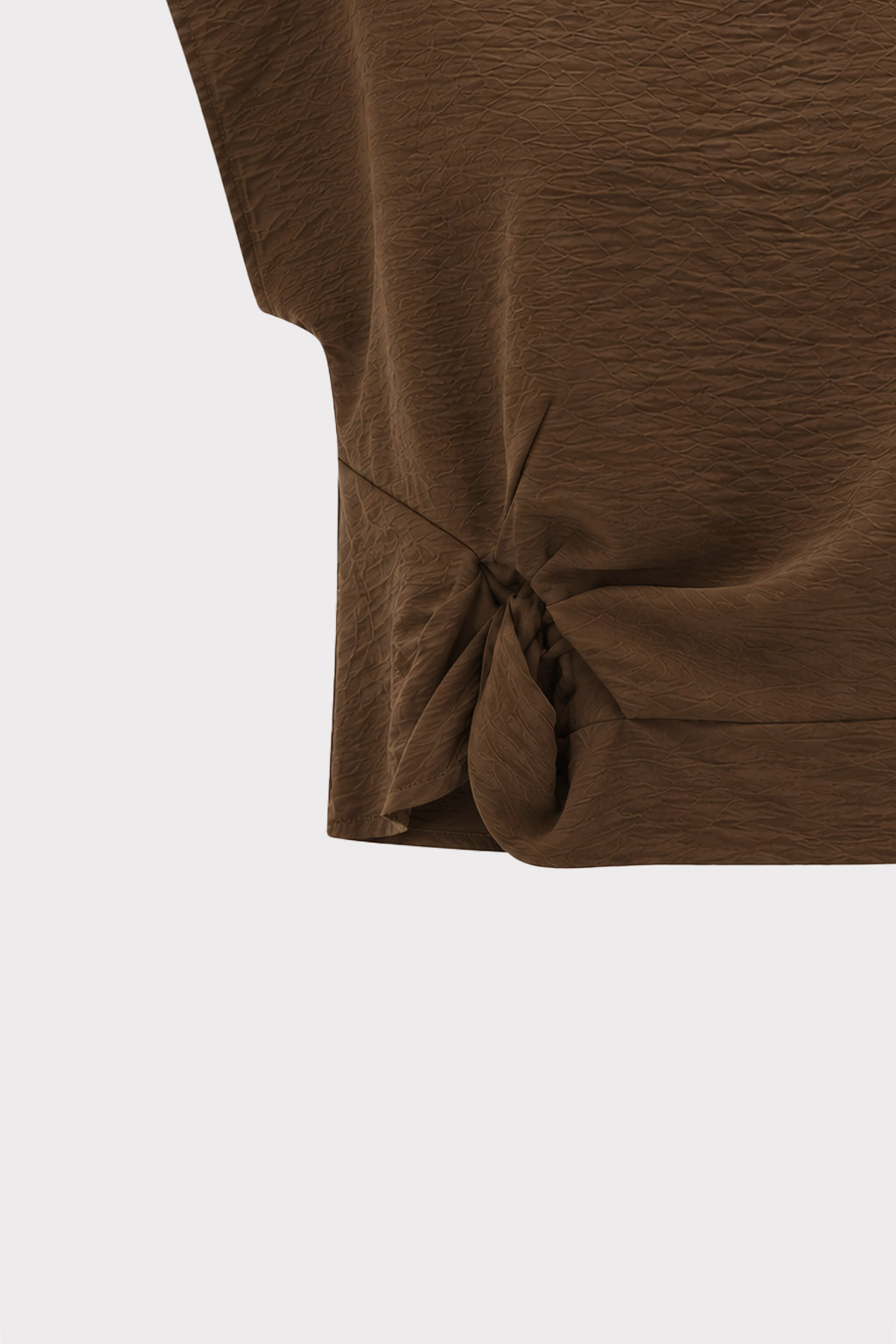 Blusa smanicata con nodo