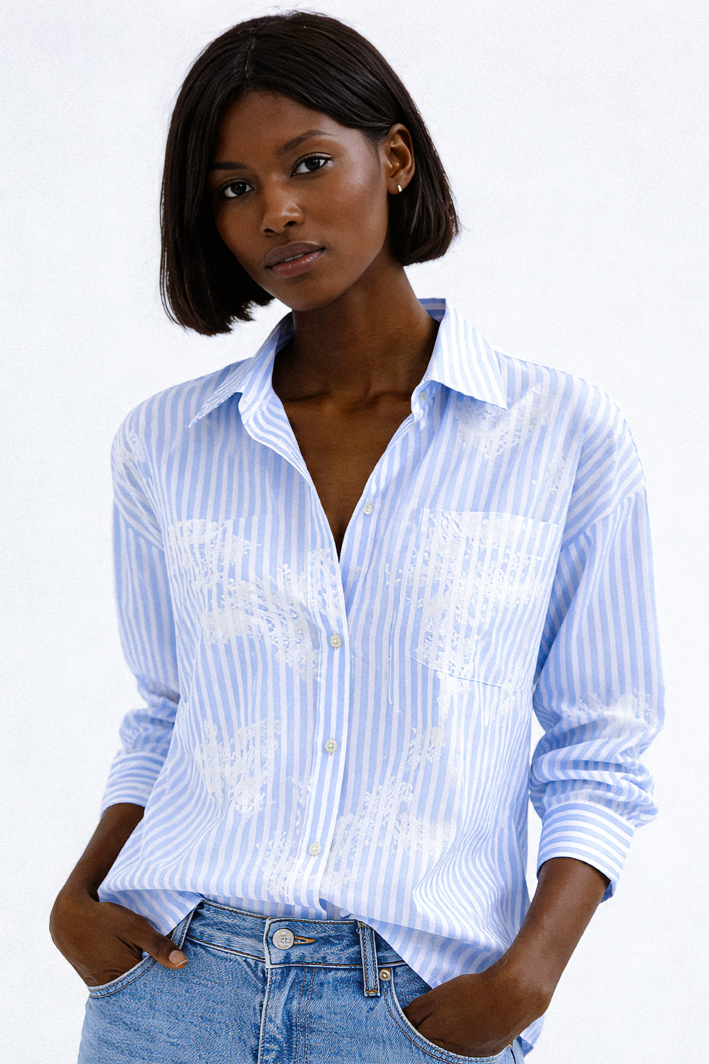 Camicia riga e stampa fiore