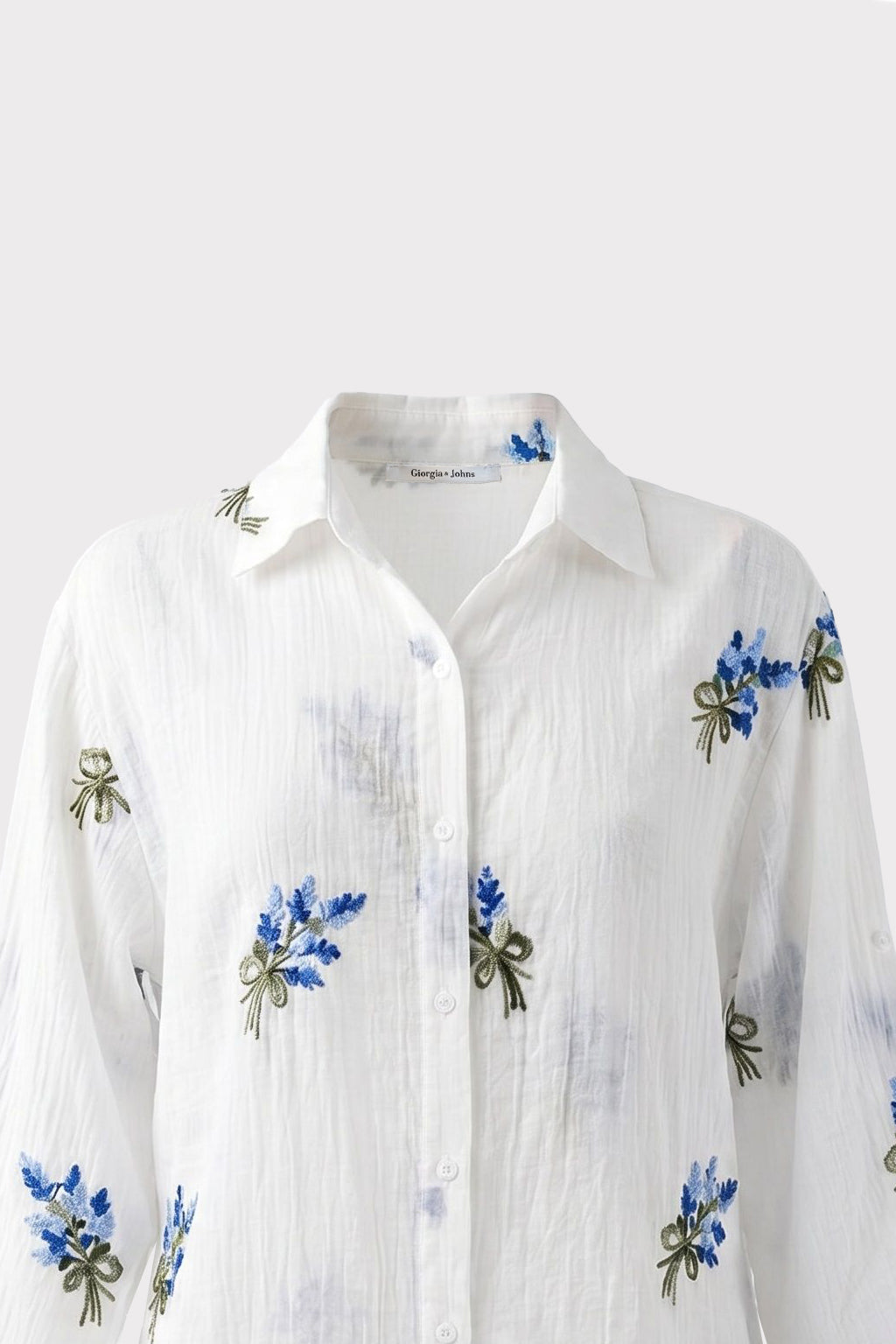 Camicia con ricami floreali