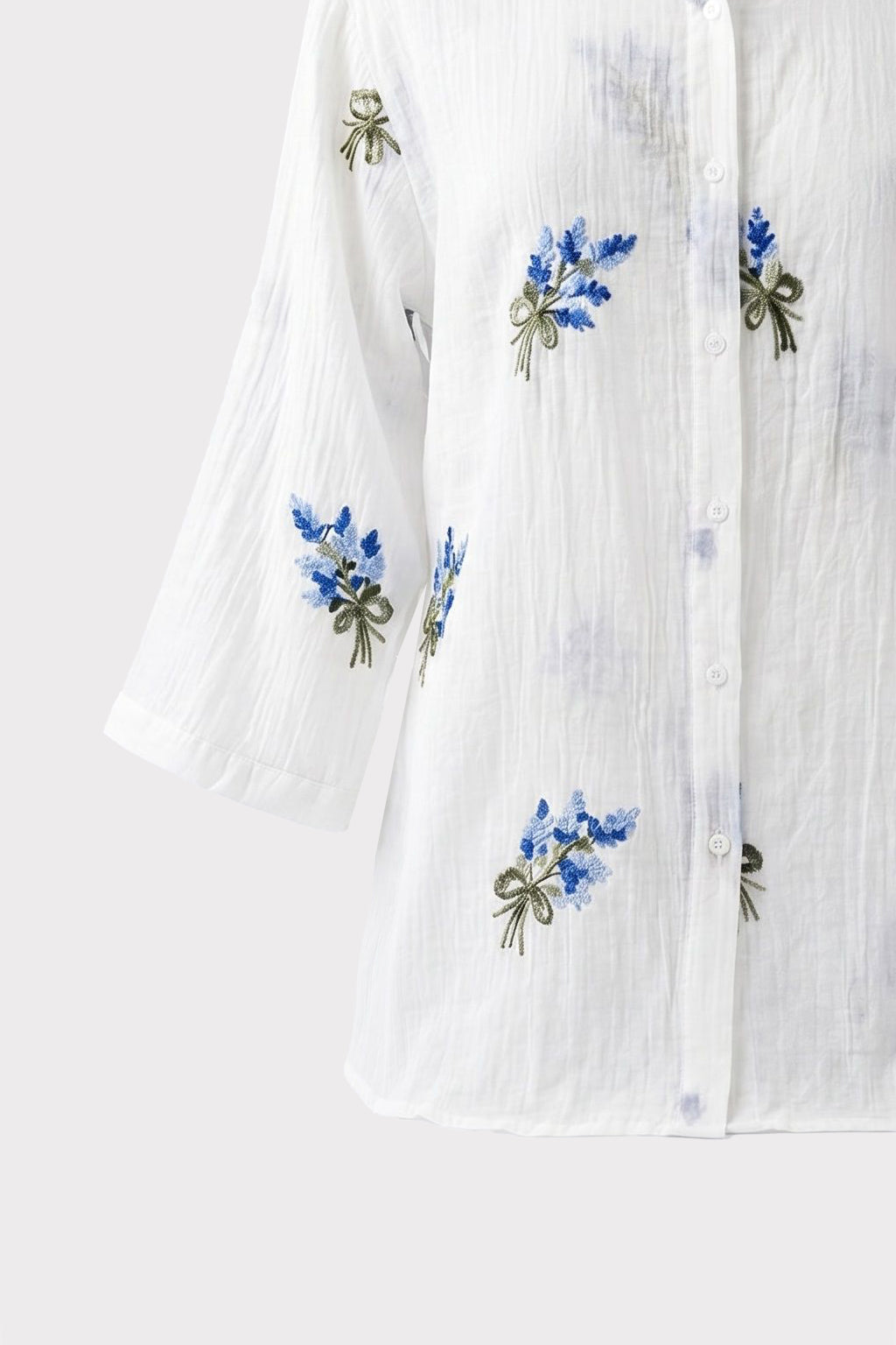 Camicia con ricami floreali