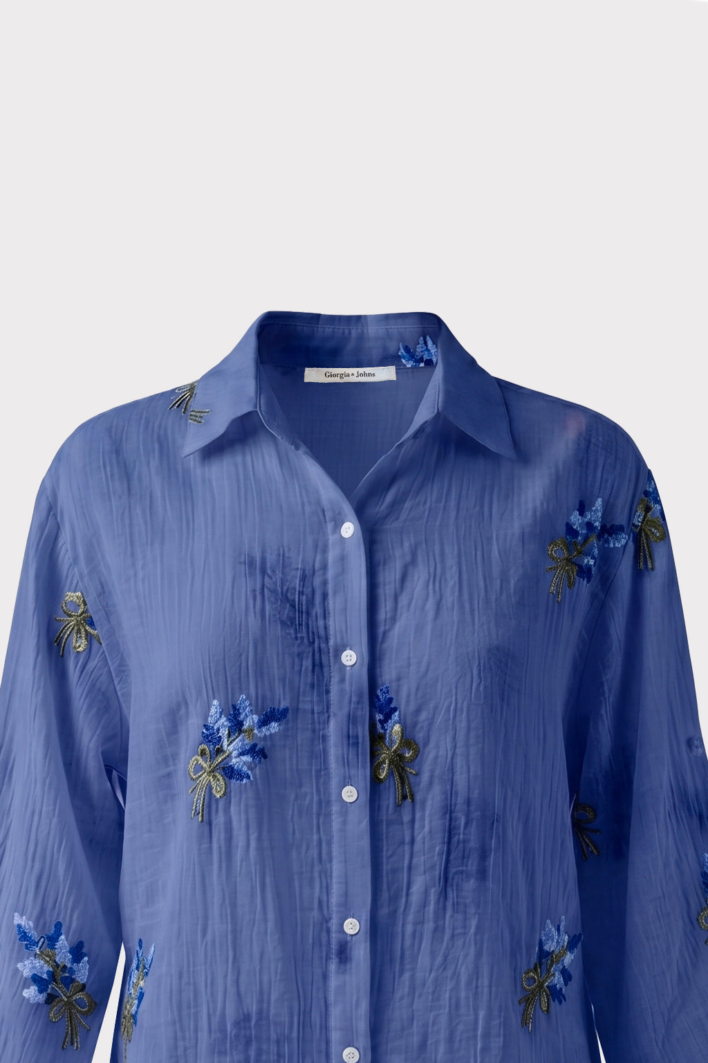 Camicia con ricami floreali